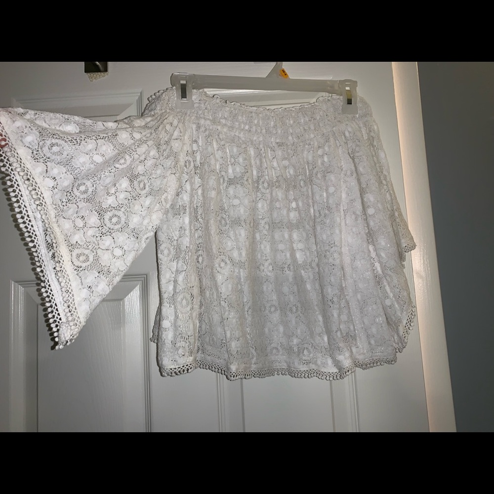 Women’s (XS) off shoulder shirt. Never worn before
